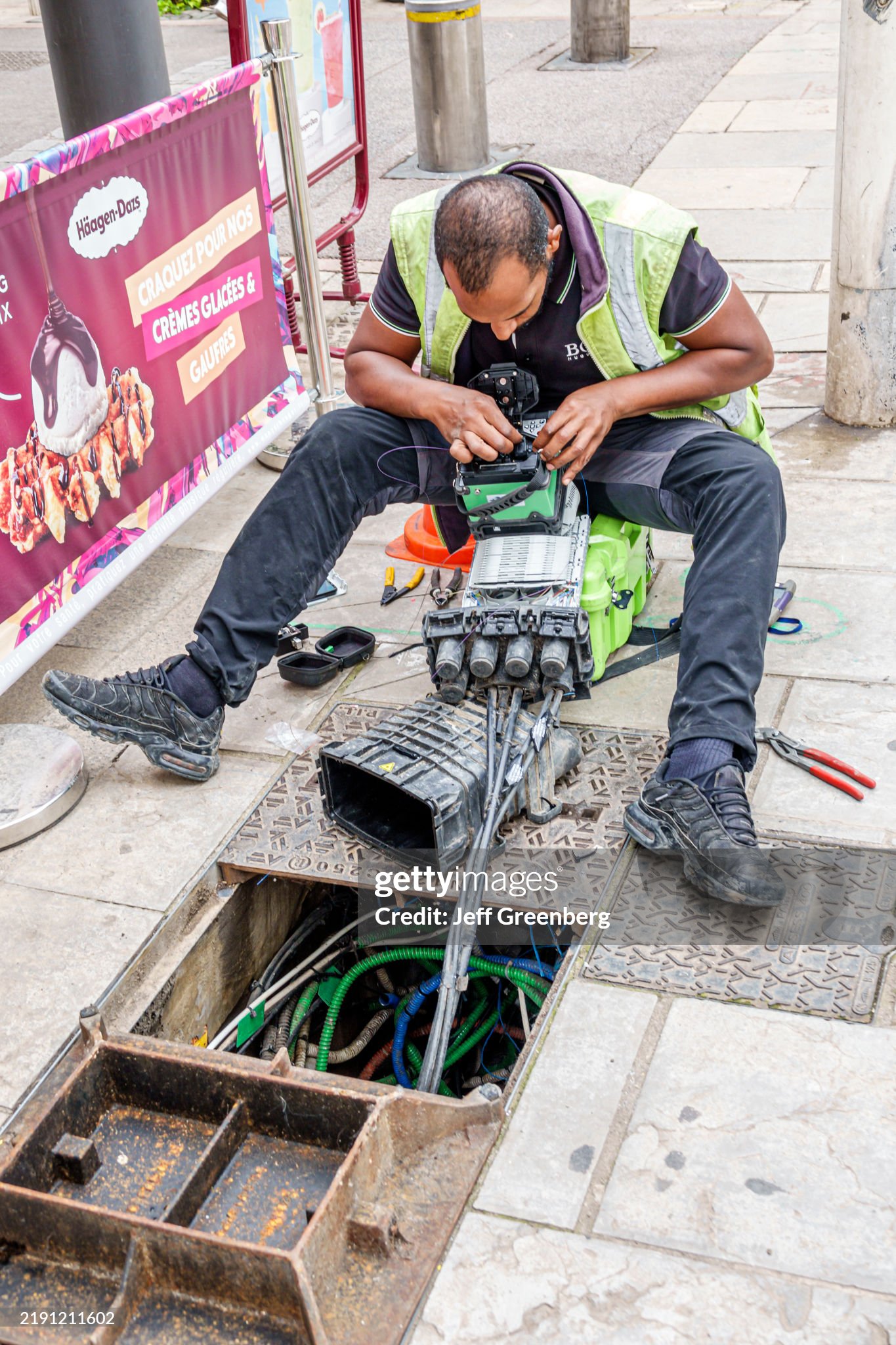 Cannes, France, Le Croisette, Rue Hoche, utility repairman technician, upgrading repairing Internet communications network. (Photo by: Jeffrey Greenberg/Universal Images Group via Getty Images)